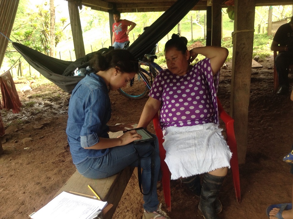 young woman interviewing female farmer