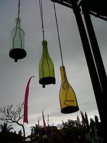 Hanging lanterns upcycled from old glass bottles