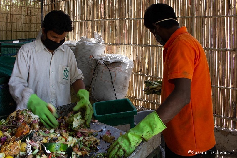 men sorting organic waste