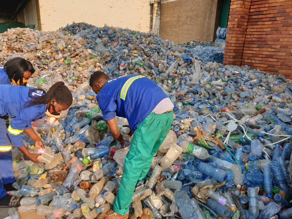 plastic bottles being sorted, Alpha Polyplast