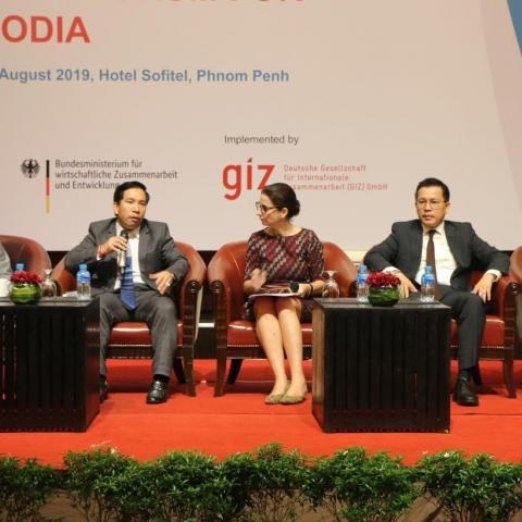 People at a panel discussion