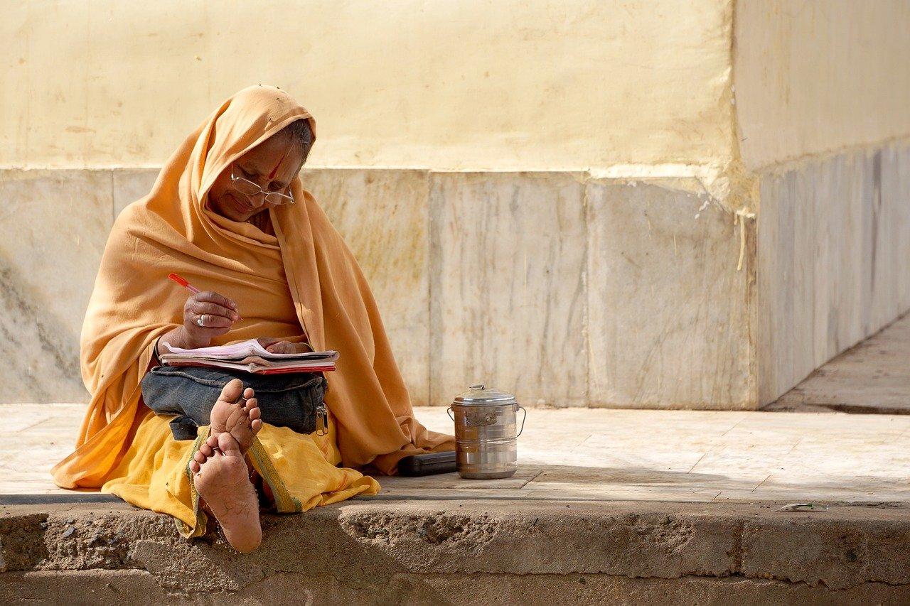 Indian woman, writing